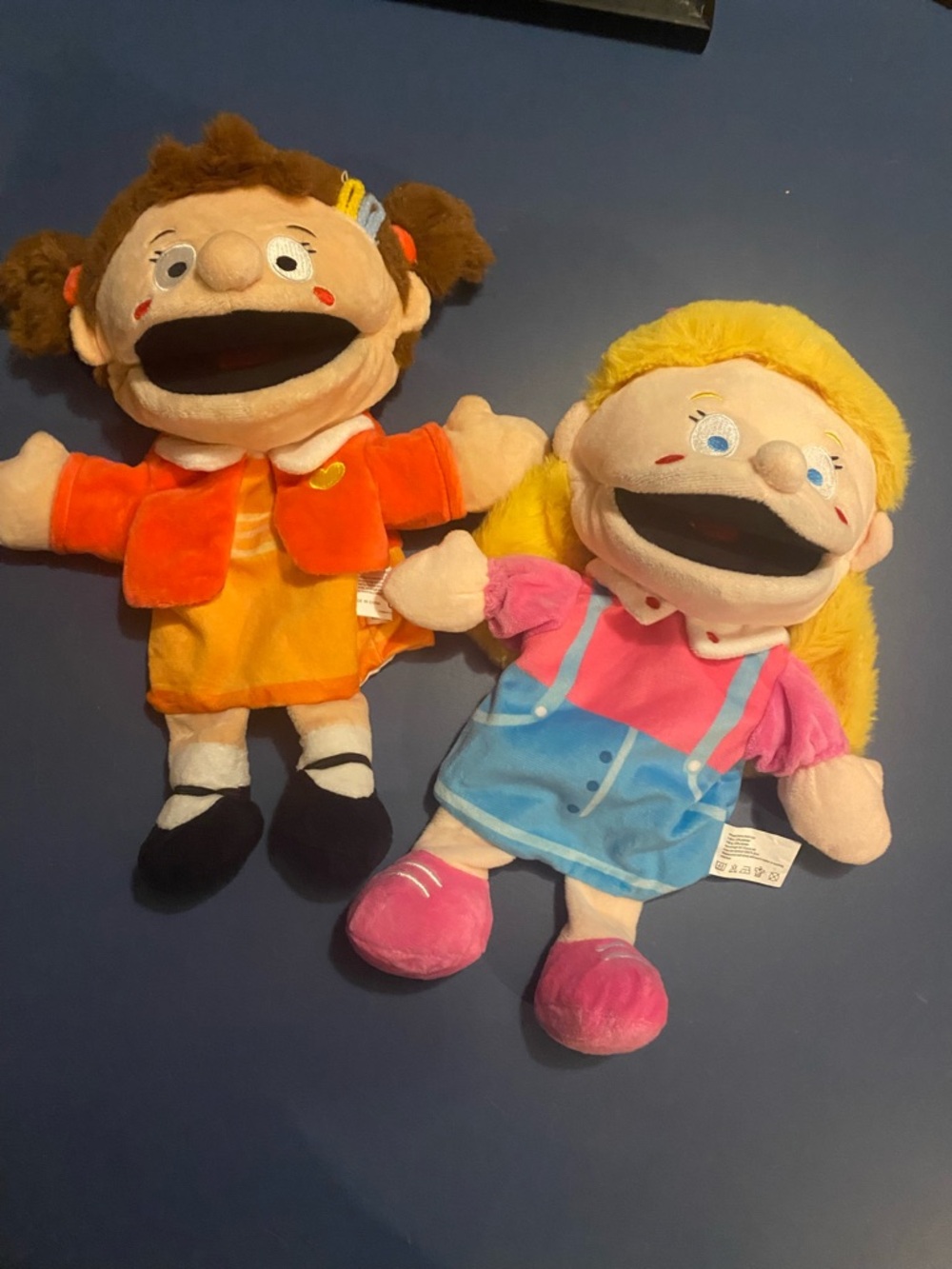 Two MVP Girls Teaching Puppets